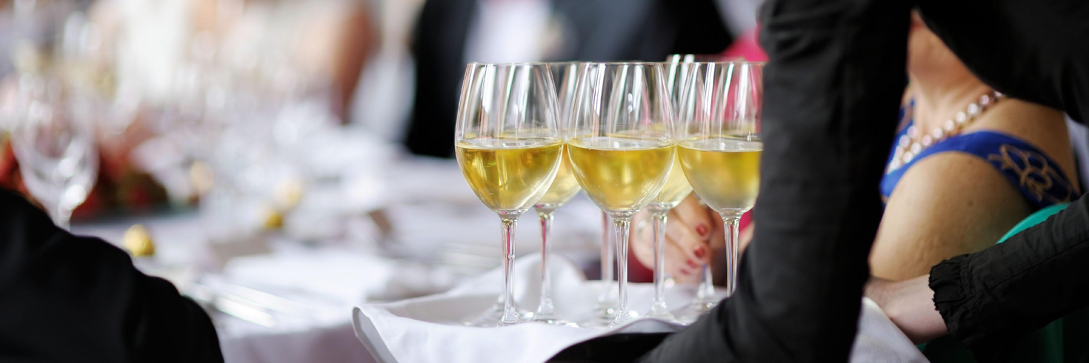 wine glasses on serving tray